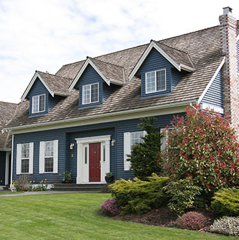 Blue House with White Gutters in Atlanta, GA